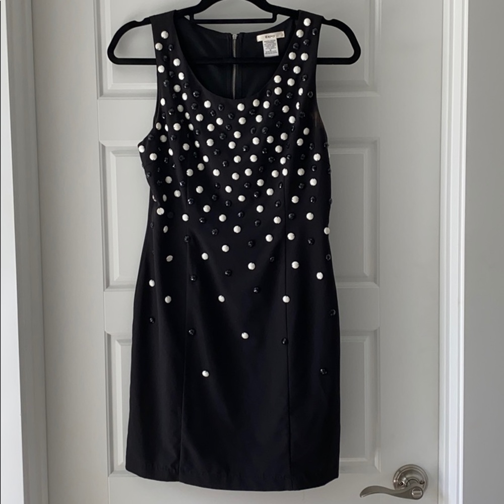 Black sleeveless dress with jewels